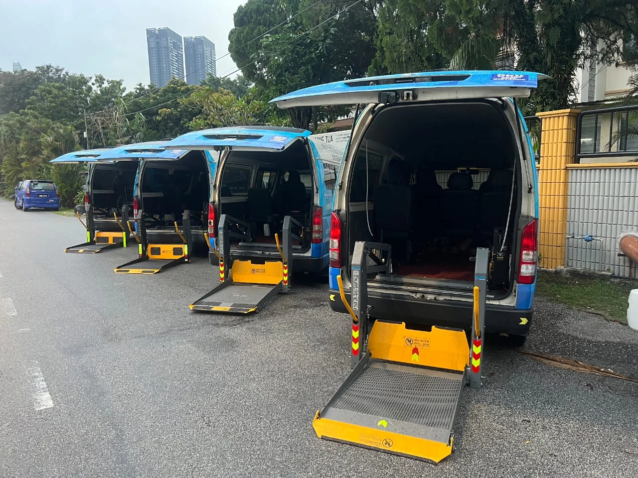 Multicare vans with rear hydraulic wheelchair lifts lowered